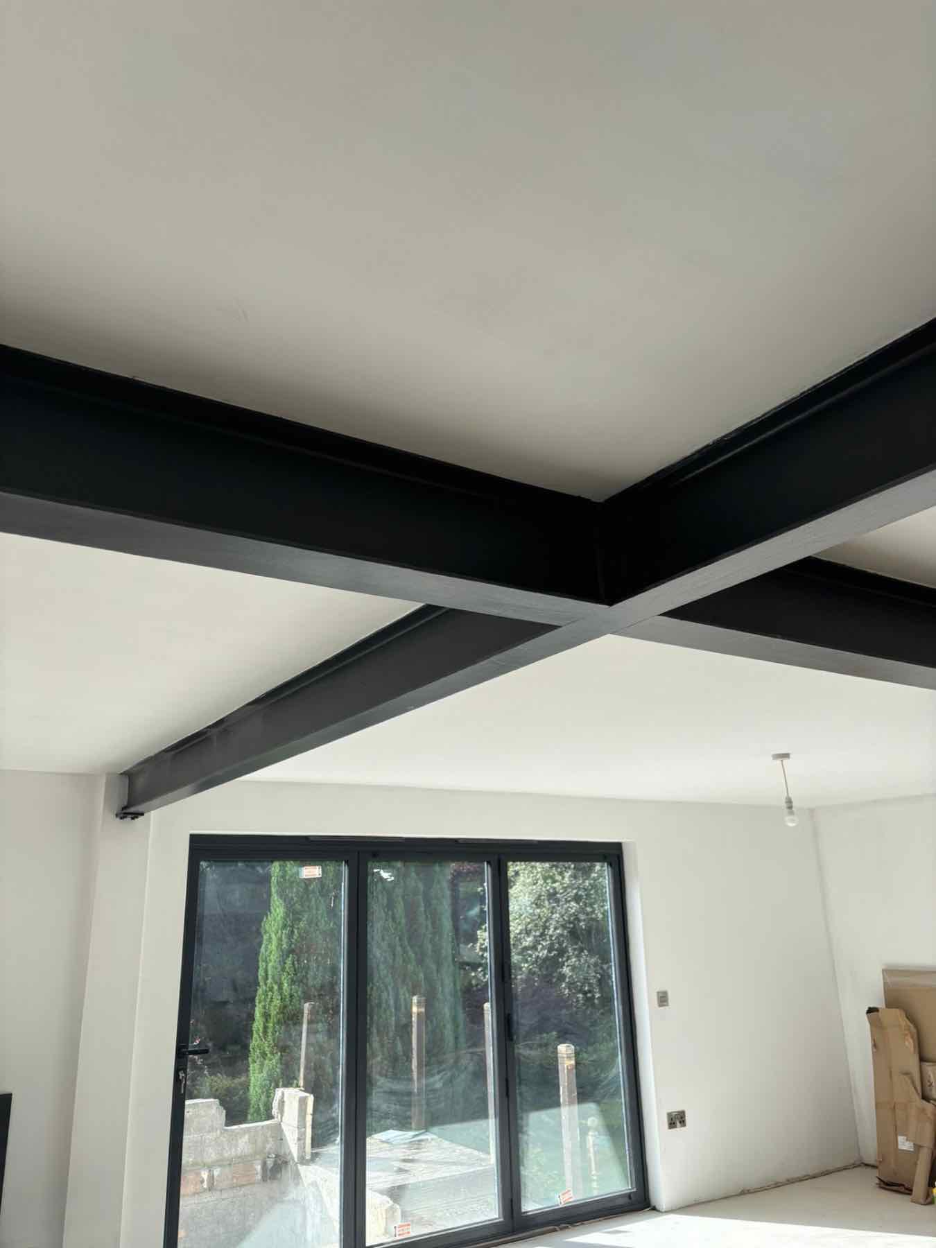 Structural opening with steel beams by Devon Build and Carpentry, North Devon
